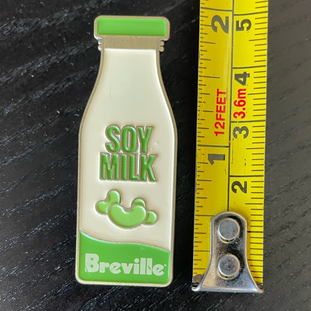 Breville Soy Milk Enamel Jacket Bag Pin NWOT